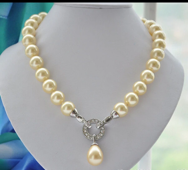 

FREE SHIPPING14mm round golden SHELL PEARL NECKLACE Drip pendant 17inch Z5259