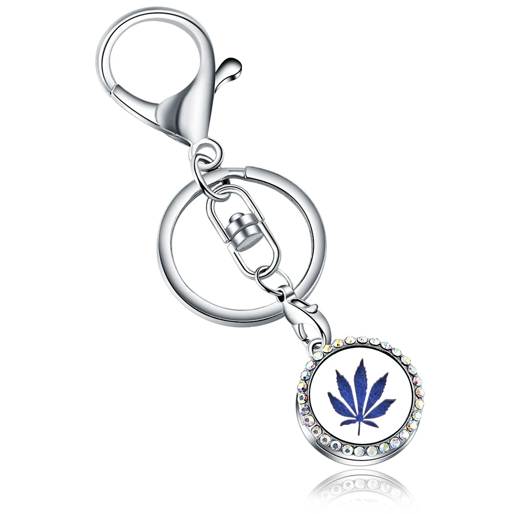 

Stainless Steel Leaf shape AB Full Rhinestone Perfume KeyChain Essential Oil Diffuser Perfume Aromatherapy Locket Key Chain
