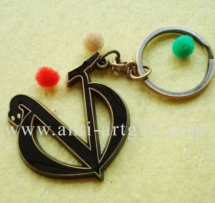 

Custom fancy Key chain black enamel with epoxy V snake antique gold metal No MOQ