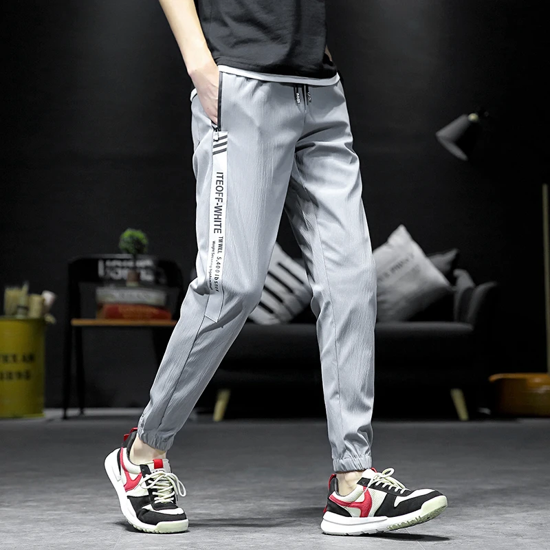 

Summer New Track Pants Men Fashion Letter Printing Casual Harem Pants Man Streetwear Wild Hip Hop Loose Joggers Sweatpants M-4XL