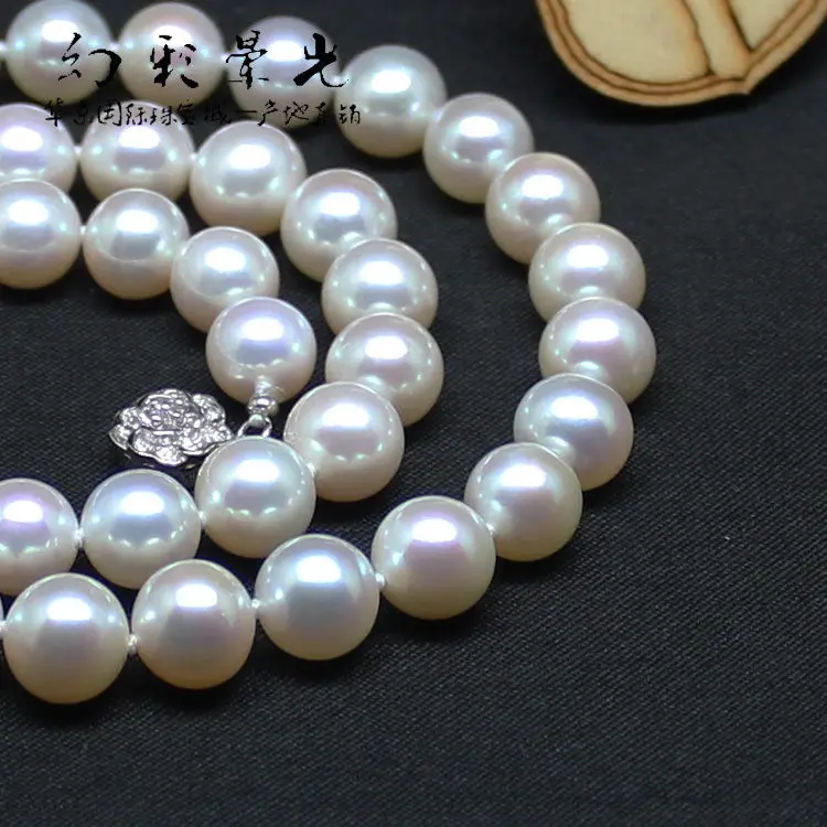 

natural 10-11mm south seas white pearl necklace18 inch silver clasp (9.13)