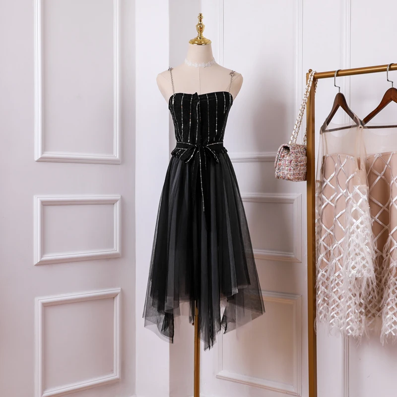 

New 2019 summer of the temperament leisure dress bowknot irregular gauze with shoulder straps black dress