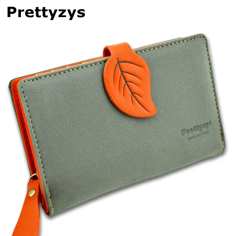 

Prettyzys leaf design medium size women wallets small coin pocket,Women bag,Korean style card holder and coin purse. Gift.