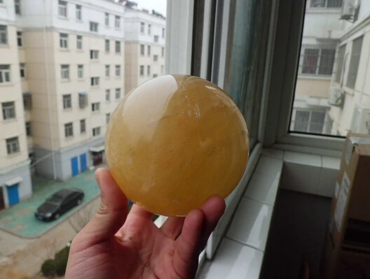 

A 422Citrine Calcite Crystal Sphere Ball Polished Healing China (0601)