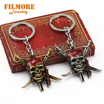 

10pcs/lot New Arrival Pirates of The Caribbean Keychain Captain Jack Sparrow Mask with Red Hood Skull and Crossbones Keyring