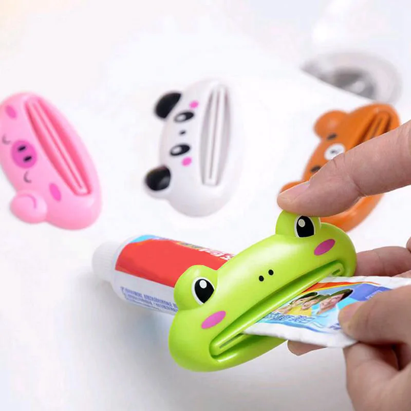 

2PCS/Lot Cute Cartoon Easy Toothpaste Squeezer Tube Rack Dispenser Rolling Holder Easy Squeeze Paste Dispenser Roll Holder