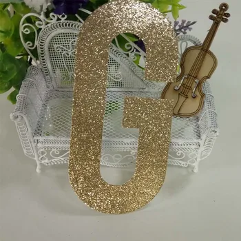 

1000piece 5" tall ring die cut of gold glitter paper for paper crafting