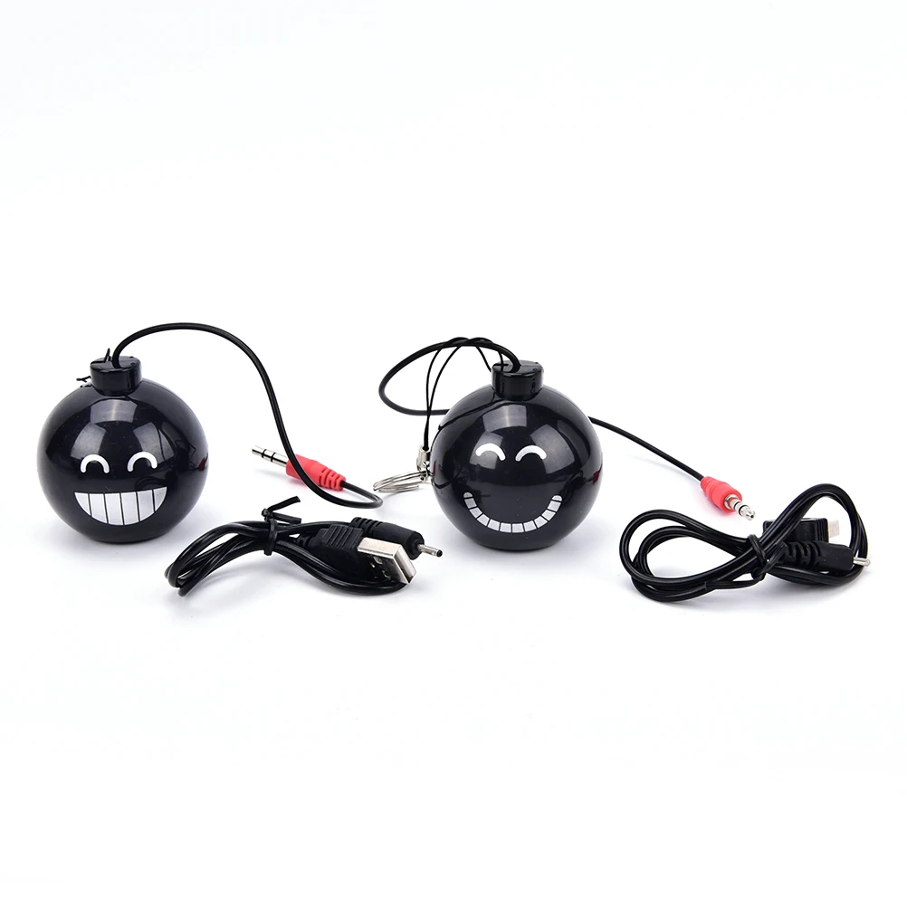 

Bomb Rechargeable Mini Portable Keychain Speaker For Phone Tablet MP3 Games 1 Pcs Cute Face Mini Speaker With Charge Cables