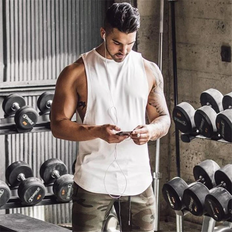 Bodybuilder in a Hood in the Gym