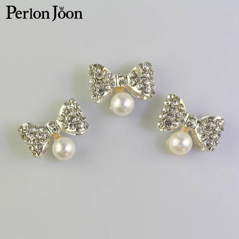 

10pcs 18*15mm Lovely Bow-knot Crystal Pearl Rhinestone metal Button For Clothing to Wedding Dress Accessories For Sewing Nk012