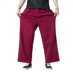 Повседневные однотонные мужские свободные широкие брюки с эластичной резинкой на талии, новые длинные брюки оверсайз
