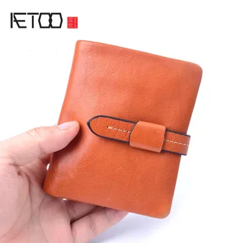 

AETOO Leather wallet male short section buckle manual vegetable tanned leather first layer leather wallet vertical section buckl
