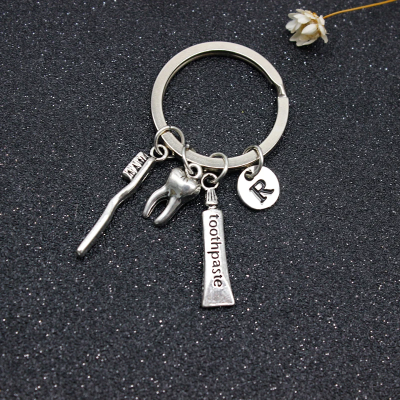 

Creative Personality 26 Letter Teeth Toothbrush Toothpaste Keychain Appeal Care Dental Health Doctor Nurse Family Friend Jewelry