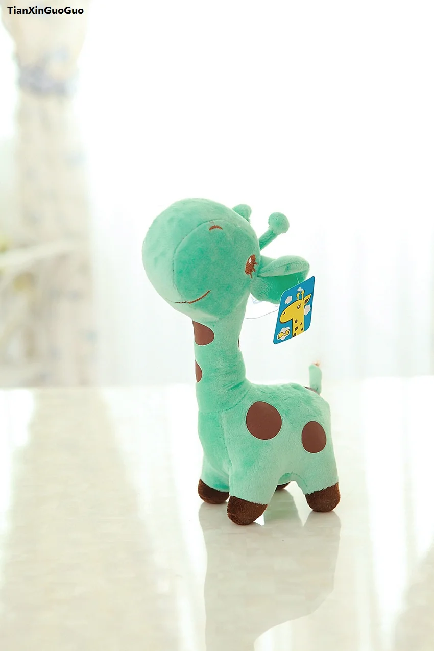 green giraffe stuffed animal