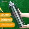 Botellas de agua con capacidad grande de 2000 ml, botella deportiva de plástico portátil para exteriores con Infusor de té, botellas de coctelera a prueba de fugas para Fitness ► Foto 1/6