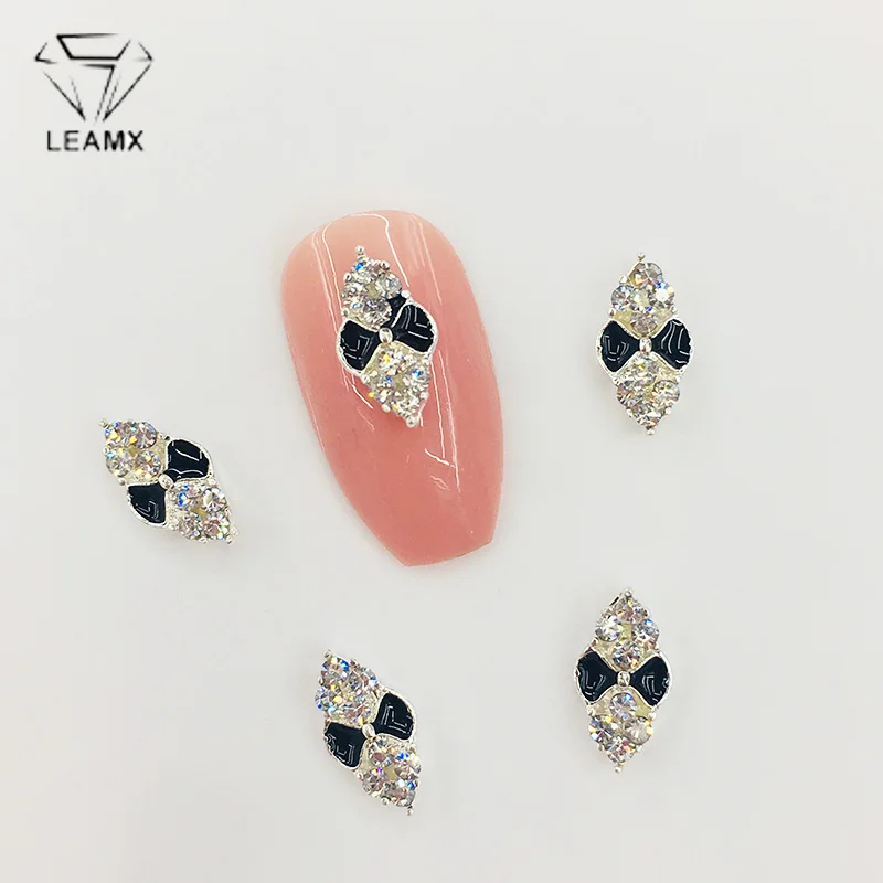 

LEAMX 10pcs Glitter Rhinestones With Bow Nail Art Jewelry 3D Metal Crystal Nails Decorations DIY Manicure Diamond Charms L507