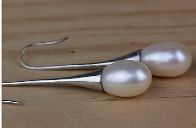 

ry00881 a charming pair of south sea white pearl earring