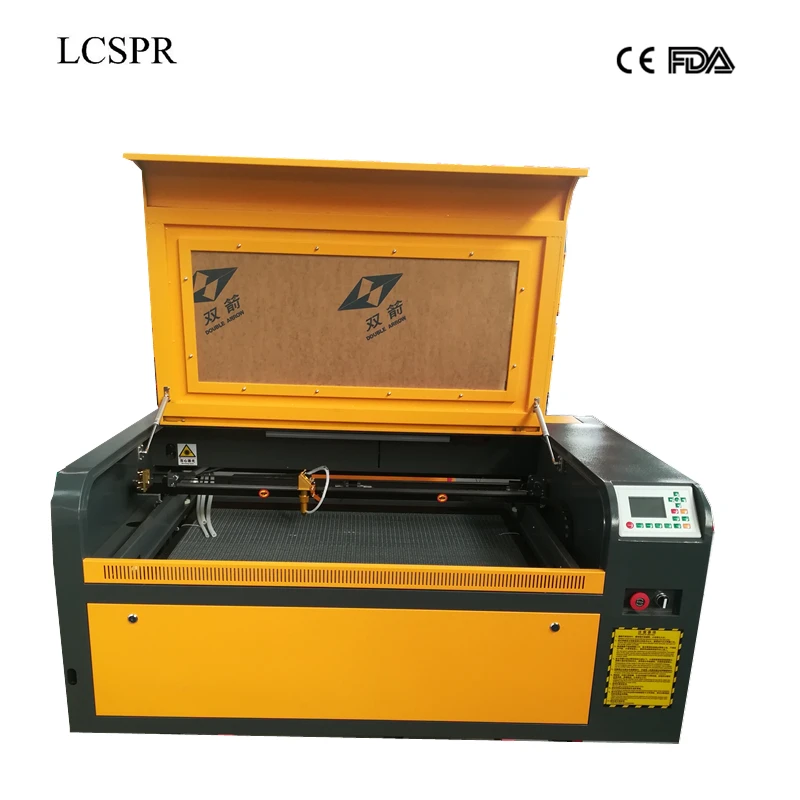 

Reci W2 CO2 100W 9060 laser cutting machine with Ruida control mainboard and 600*900mm auto up and down honeycomb table