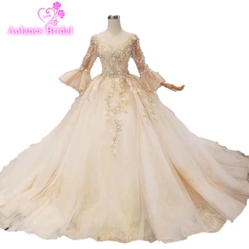 

Luxury Gold Wedding Dress Puffy Sleeves Lace Wedding Dresses 2019 With Beads Long Train Real Photos Custom Made Bridal Gowns