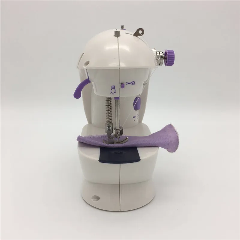 Portable ewing machines Mini Handheld sewing machines Sew needlework Cordless Clothes Fabrics Manual Household Sewing Machine