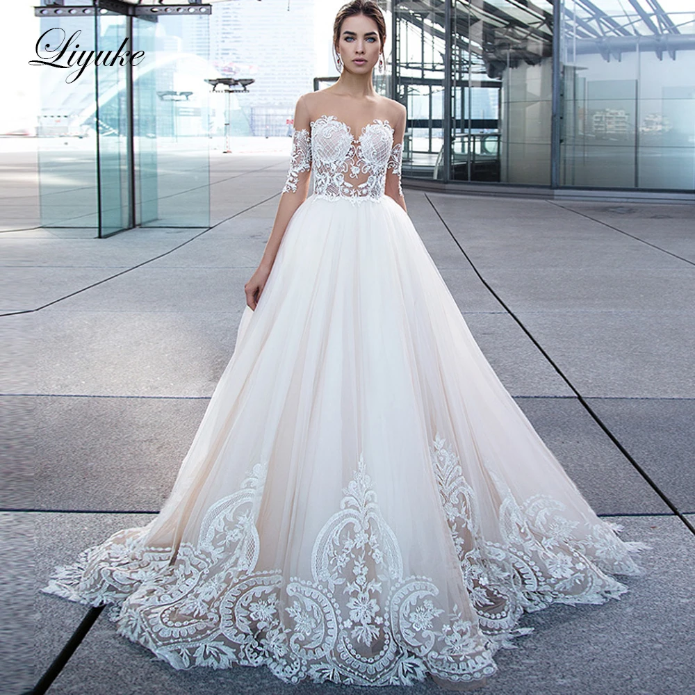 

Liyuke Skin Color Thin Tulle With The Half Sleeve Of A Line Wedding Dress Court Train Wedding Gown