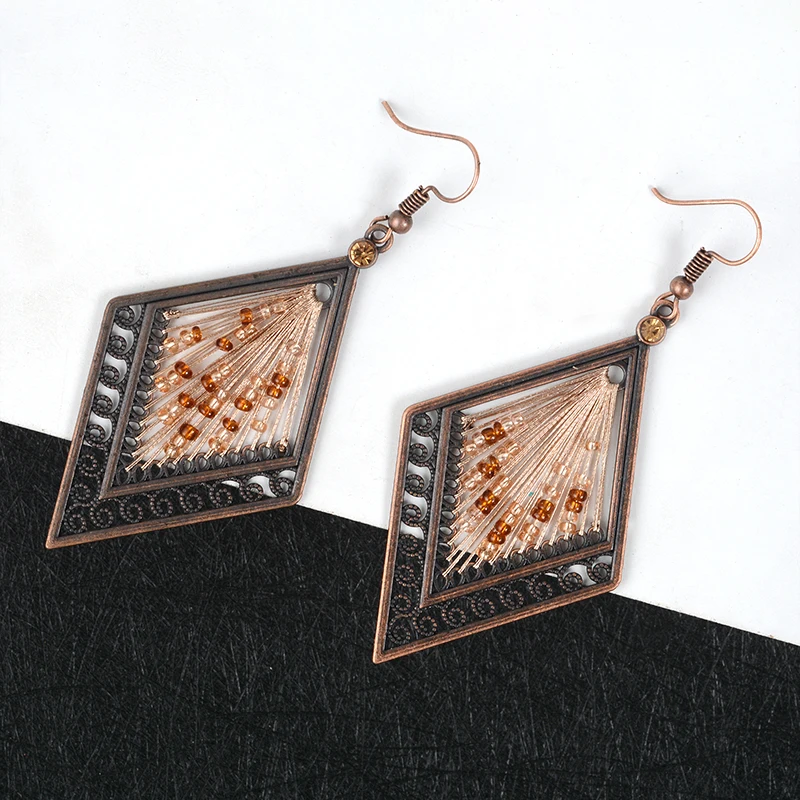 

Vintage rhombus Beading Ethnic Drop Earrings Hollow spiral Earrings cotton wool earrings for women Gift Jewelry Wholesale