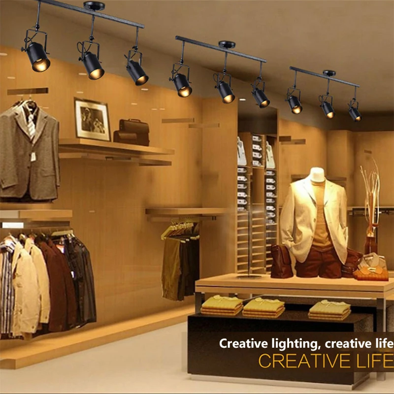 com lampada pingente para loja de roupas 05