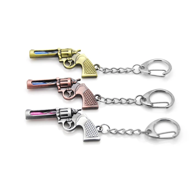 

Novelty Vintage CS GO Hourglass Revolver Gun Keychain Men Trinket Bullet Pistol Car Keychain Airplane Key Ring Jewelry Gift