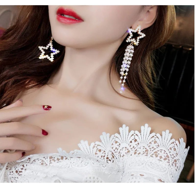 

2019 Fashion asymmetric pearl five-pointed star tassel long earrings temperament silver needle ear stud personality female