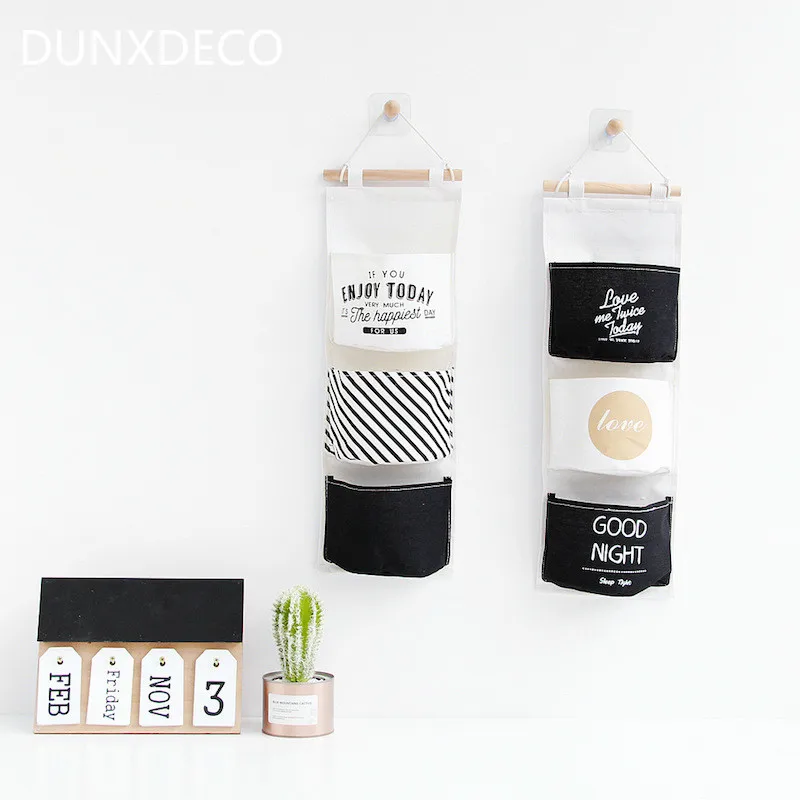 

DUNXDECO Home Office Storage Hanging Pocket Organiser Wall Door Hanger Storage Nordic Simple White Black Love Words Kid Room Dec