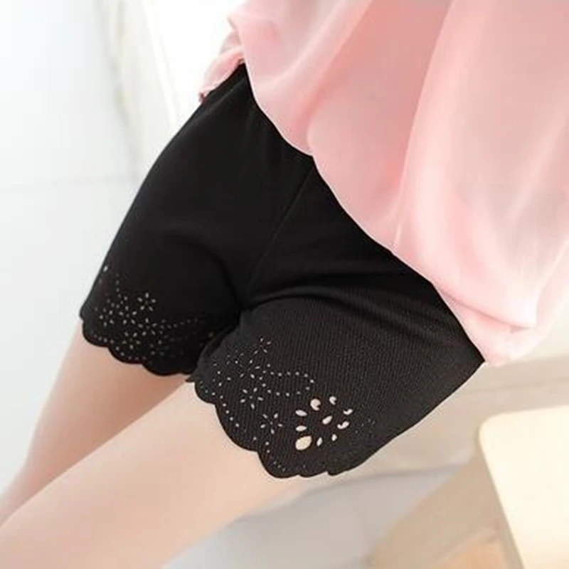 

CHSDCSI Summer Korean Style Women Clothing Black Shorts Elastic Mid Waist ruffles Hollow out Flower Shorts Spandex Short Pants