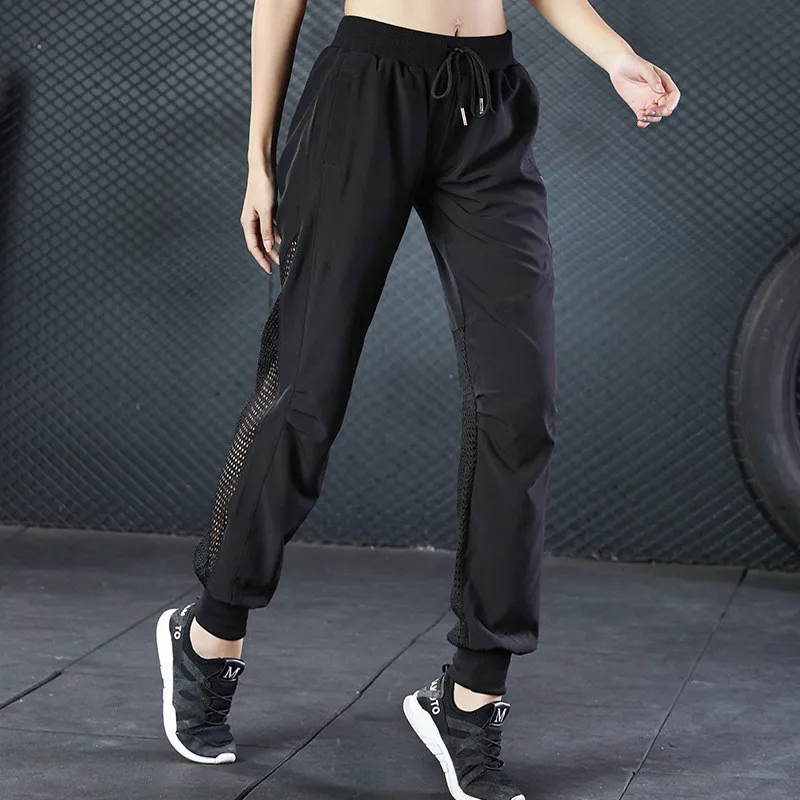 

JINXIUSHIRT Women Elastic Yoga Sports Pants Running Exercise Fitness Gym Quick Dry Training Sexy Mesh With Pocket Pants CK875