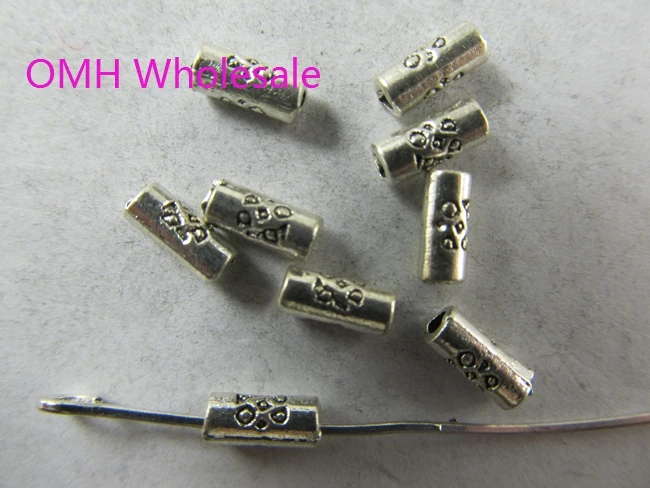 

OMH wholesale 250pcs 7x3mm DIY Jewelry accessories cylindrical flower Tube Tibet silver Zinc alloy space beads PJ65
