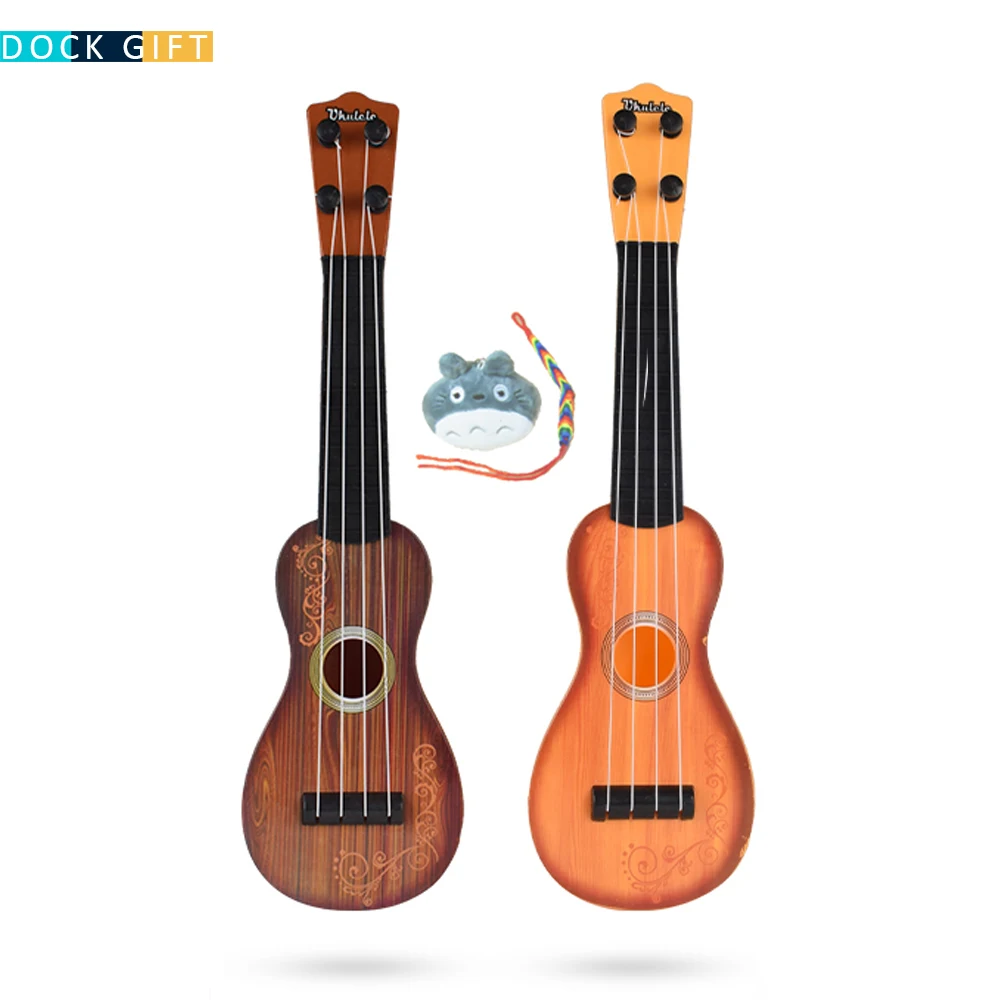 

Ukulele Toy 4 Strings Hawaii Guitar Mini Guitar for Children Gift with Plush doll Uke YL01