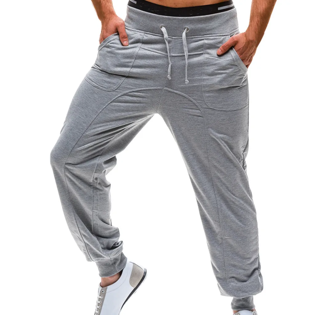 

Men's Casual Trousers Pure Color Tethers Pocket Elastic Belts Loose Sports Pants c0315