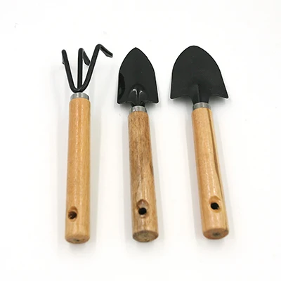 

3Pcs Mini Garden Hand Tool Kit Plant Gardening Shovel Spade Rake Trowel Wood Handle Metal Head Gardener Hot Sale