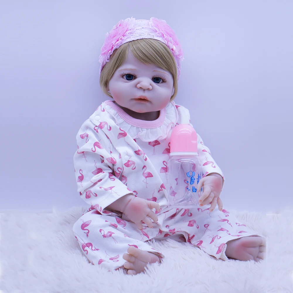 

57cm whole hard Silicone Reborn Baby straight hair Girls Doll Princess Babies With flamingo cartoon clothes Bebe doc masha Toy