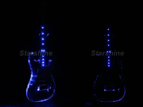 

Starshine LED Electric Guitar DK-STB Acrylic Body BlueLED Color Tremolo Bridge White Pickguard Dots Inlay 9V Battery Frets Light