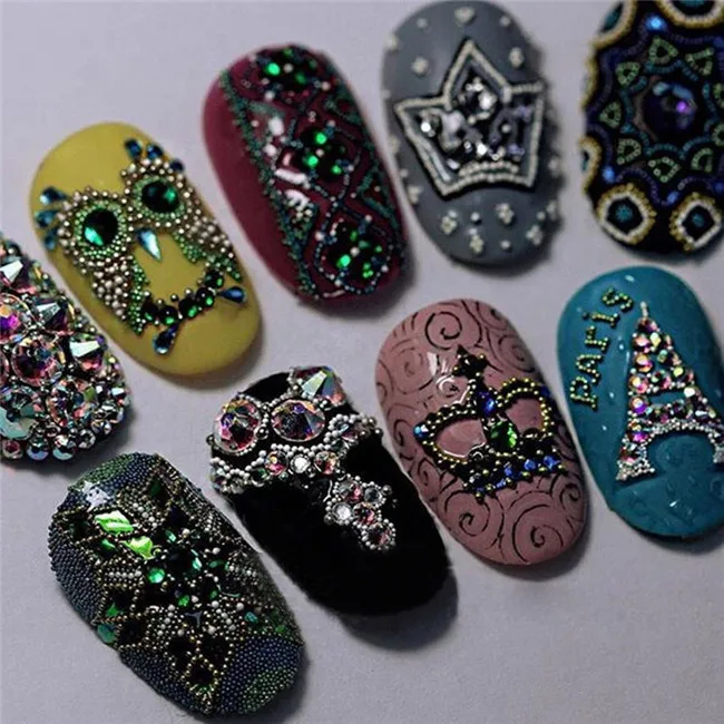 Amouage gold инкрустация золотом. выкладка страз. инкрустация стразами на ногтях. инкрустация (интарсия, маркетри и мозаика). инкрустация камнем по дереву.