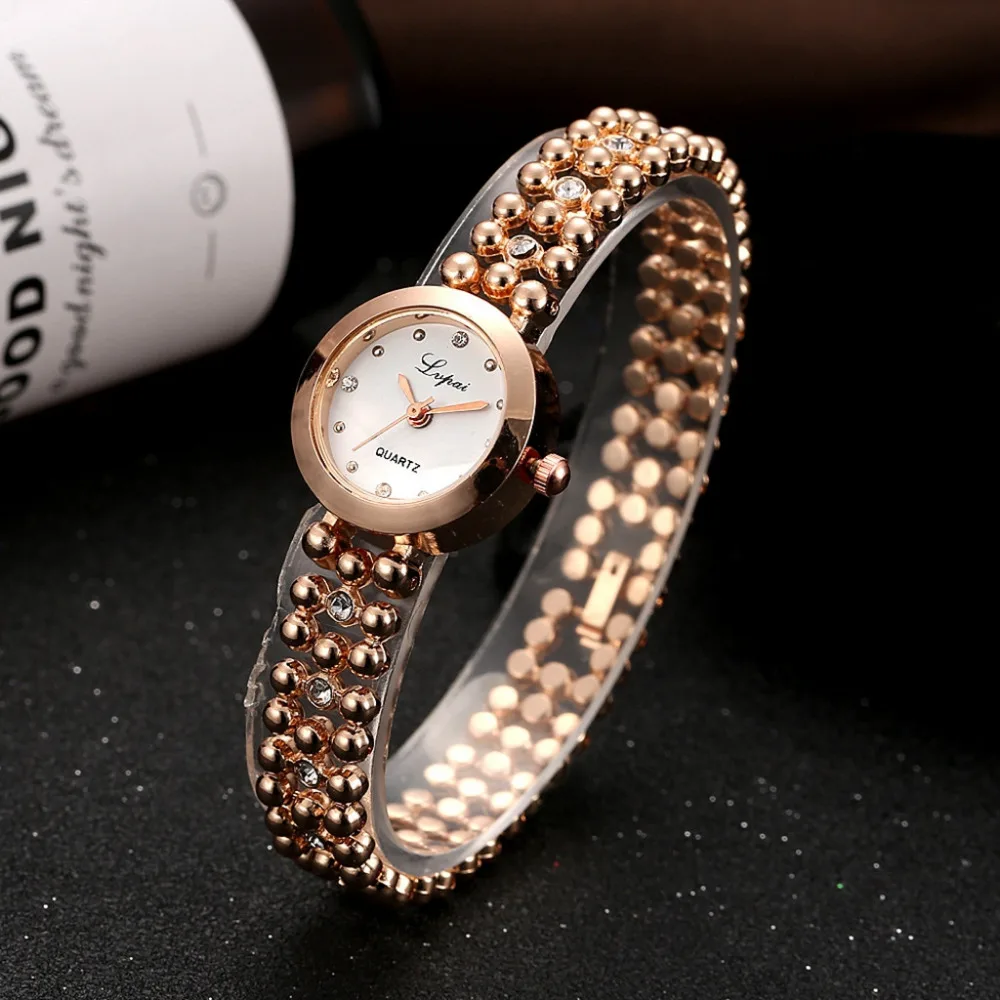 Для женщин часы Роскошные модные Алмазный бисера цепи часы темперамент листья браслет розовые, золотые, женские кварцевые часы в подарок A40