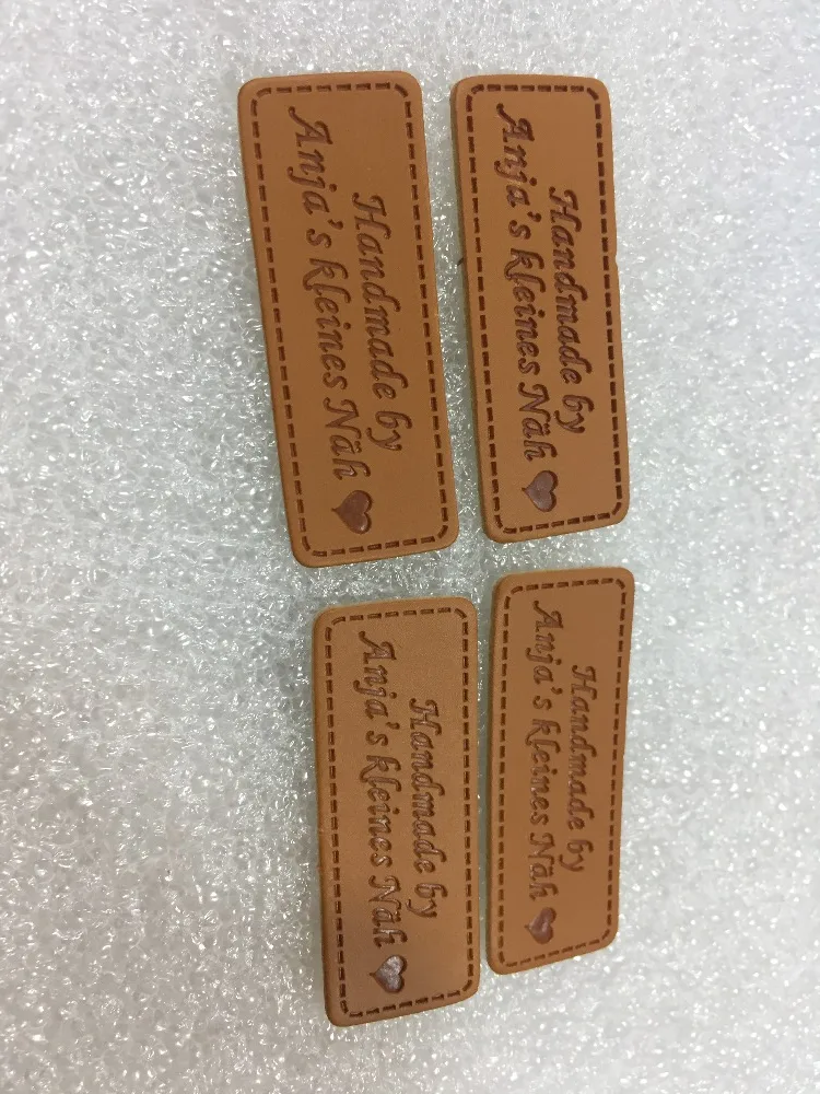 

Customized leather label simulation / pu label sewing on tags main label for handicraft jeans clothes text handmade by ......