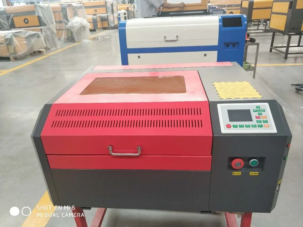 

RUIDA control 4040 laser engraving and cutting machine with 50W laser tube and auto up and down table