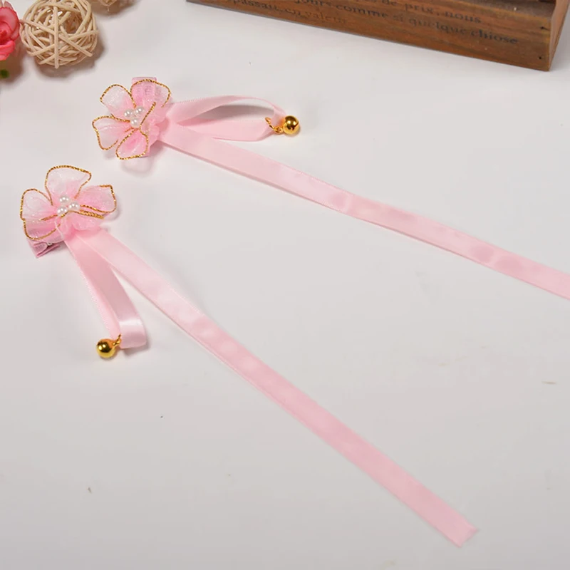 

2019 new children's cute hair accessories ancient wind Juan yarn fabric flower ribbon bell hairpin female baby hair accessories