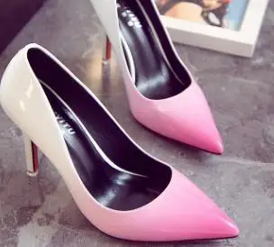 

2018 new European and American new pointed shallow mouth high heels fashion color matching patent leather stiletto wild trend wo