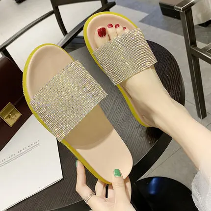 

Slippers women wear 2019 summer new students wild rhinestones thick bottom candy color beach wet water word drag