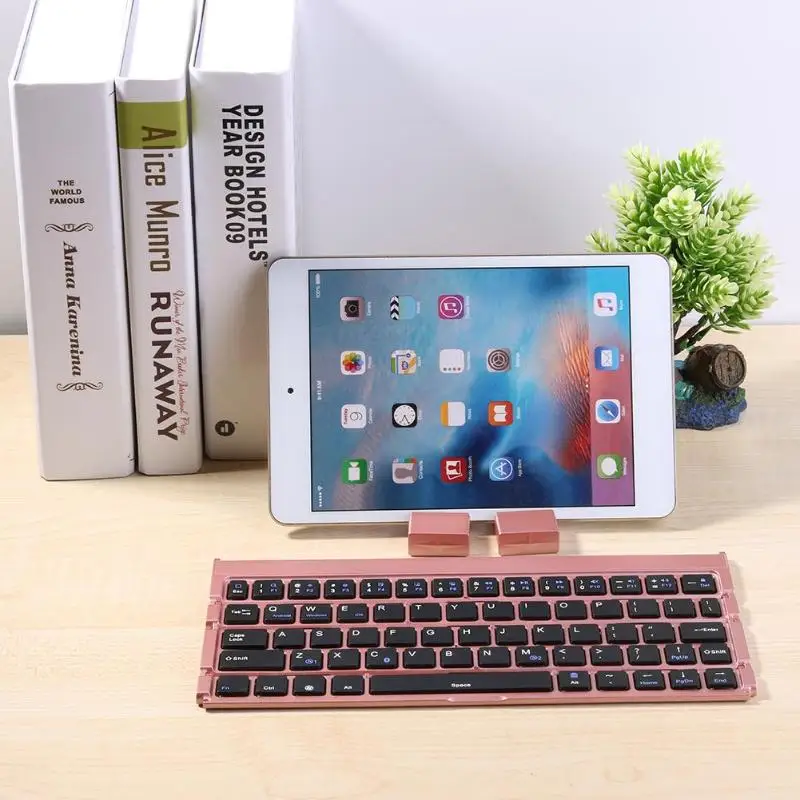 

Wireless Foldable Bluetooth Keyboard Mini 64 Key Keypad for Tablet Laptop