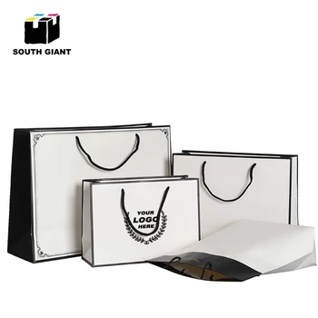 

Custom Logo Brand Matte Paper Gift Bags with Handles for Retail Garment Shoes Boutique Cosmetic DIY White Paperboard Bag