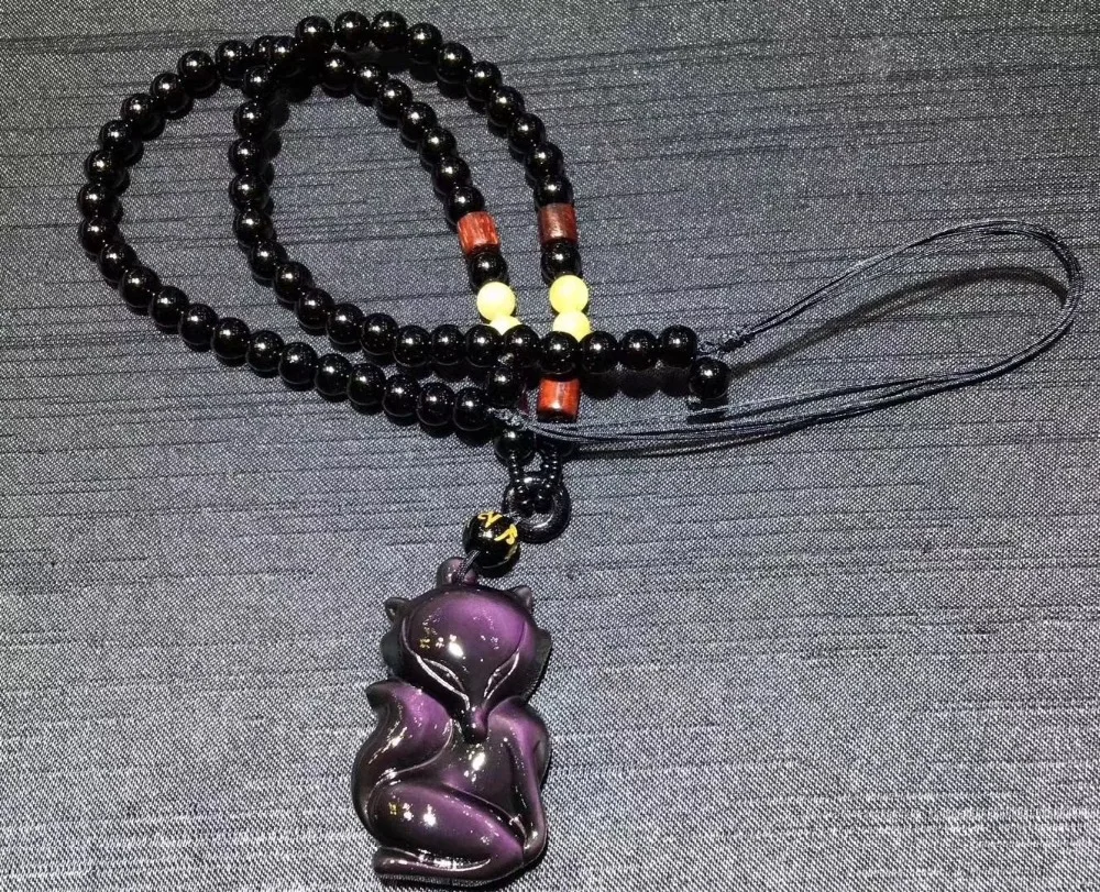 

Fox carved in natural color obsidian with an obsidian bead chain