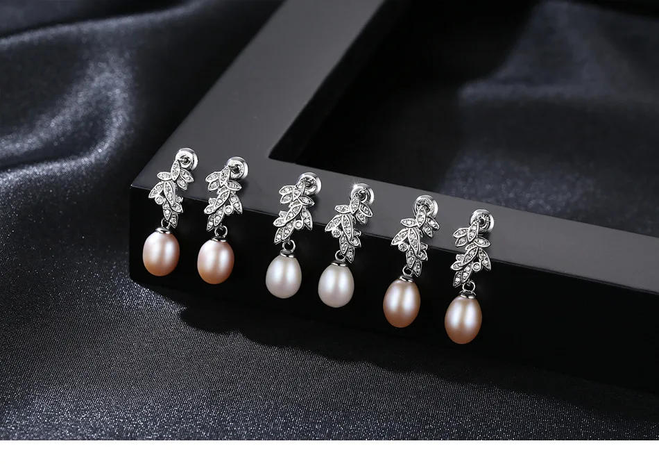 

S925 sterling silver inlaid zircon natural rice beads fashion temperament wings earrings Y06
