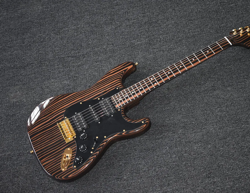 

Factory Zebra Wood Electric Guitar with Black Pickguard,HSH Pickups,Zebra Wood Fretboard,Gold Hardwares,Can be Customized